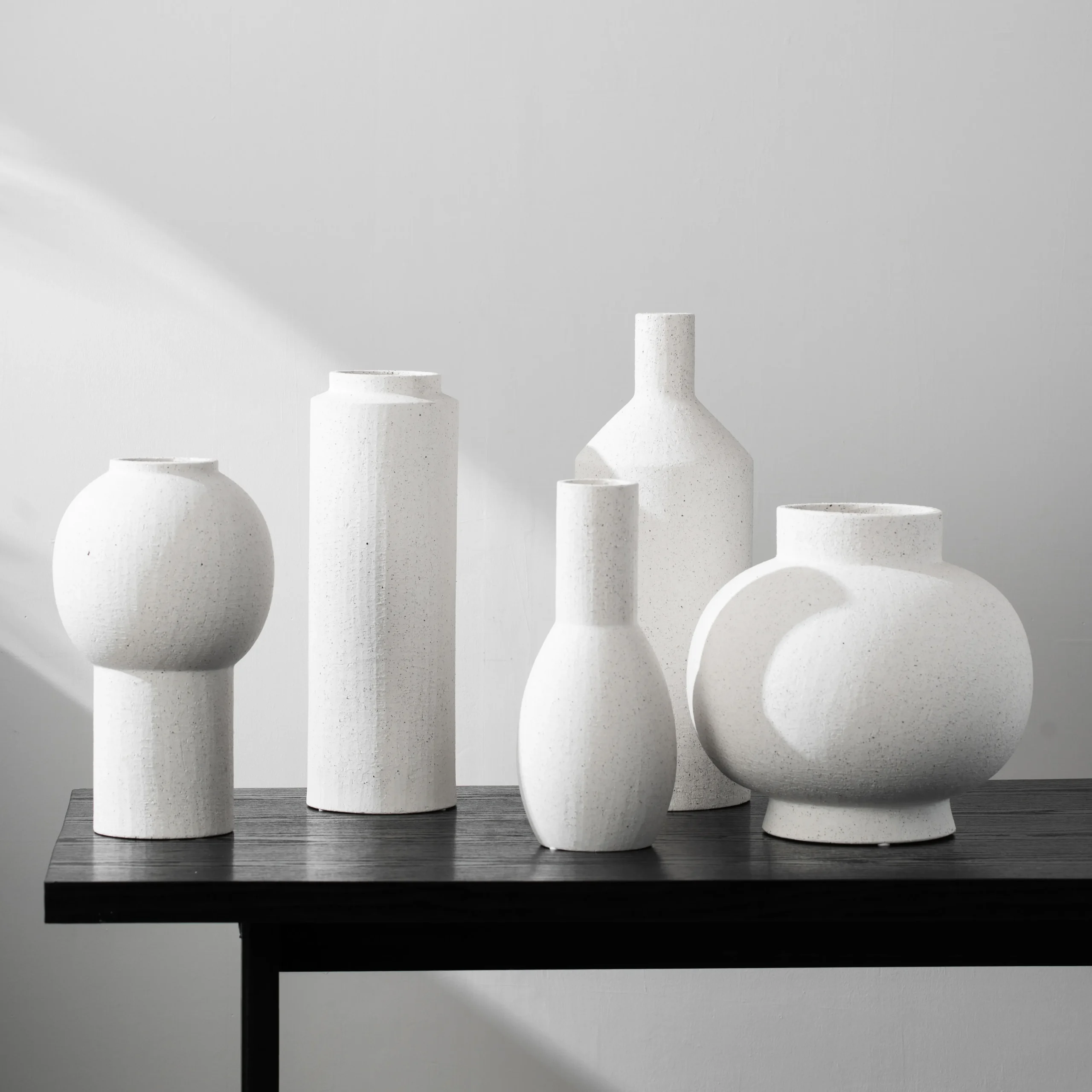White sand vase