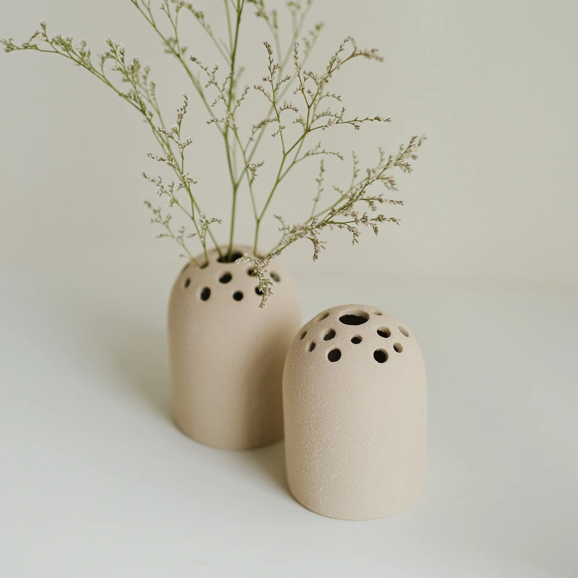 Perforated flower vase/ornament