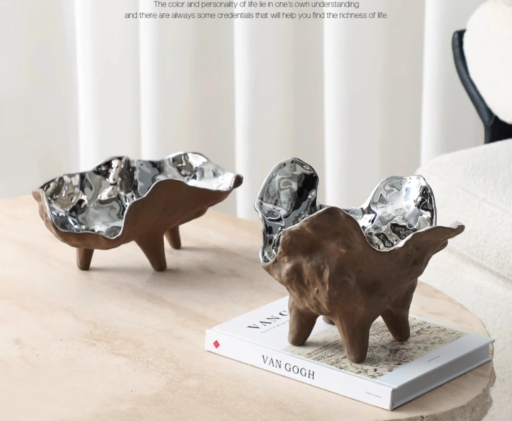 Simple and creative irregular electroplated ceramic fruit bowl, living room showroom storage fruit plate, coffee table, soft decoration ornament.